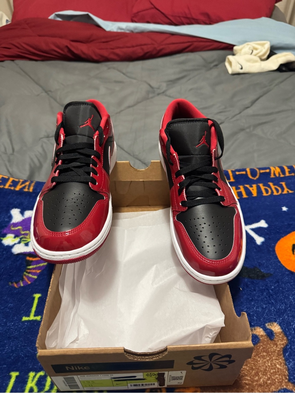 Nike Air Jordan 1 Low-Top Sneakers - Black and Red